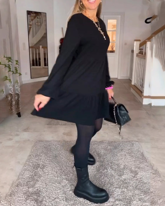 Enkel ensfarget langermet kjole