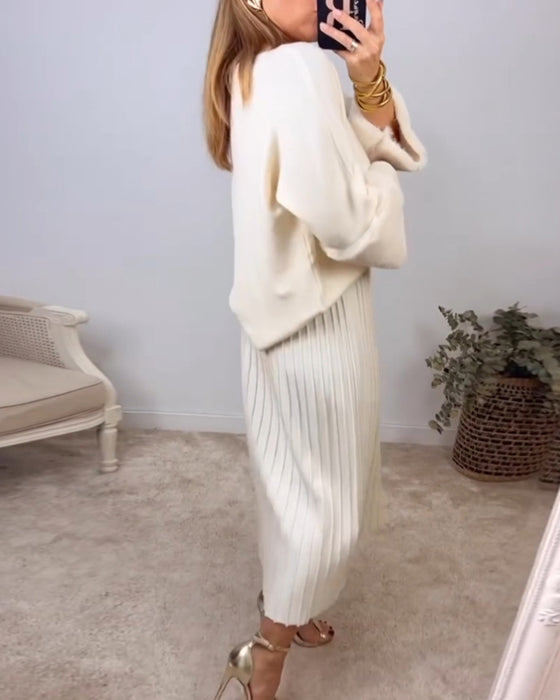 Elegant ensfarget genser med lange ermer