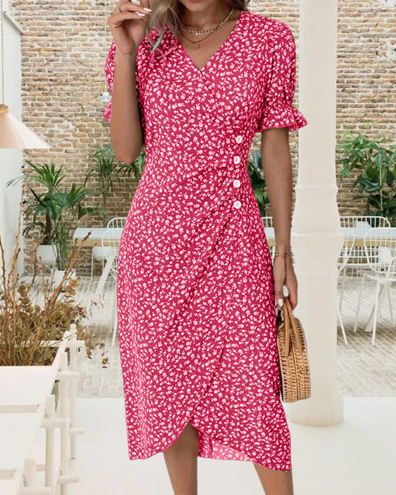 Kjole i blomsterprint med korte ermer