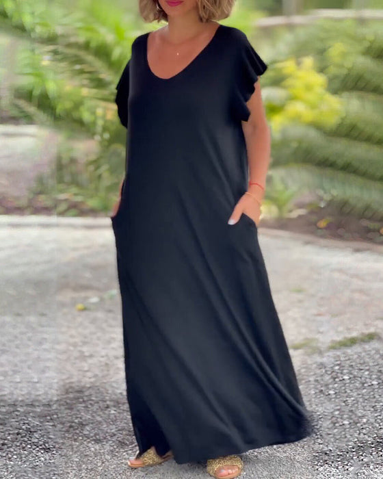 Lang kjole i ensfarget med lomme og kort erme