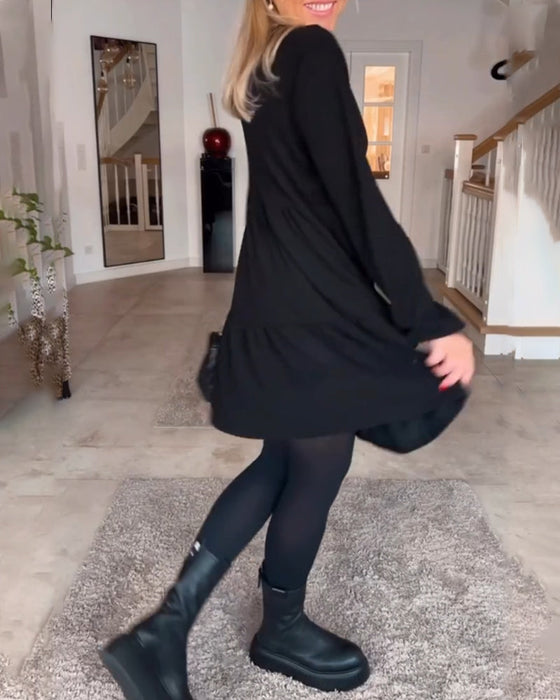 Enkel ensfarget langermet kjole