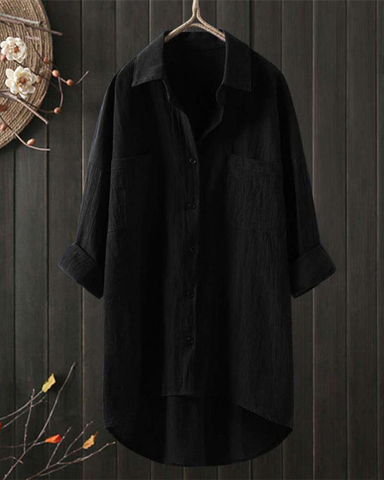 Løs bluse med ensfarget med langermet