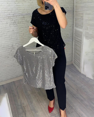 Kortermede damebluser i paljett