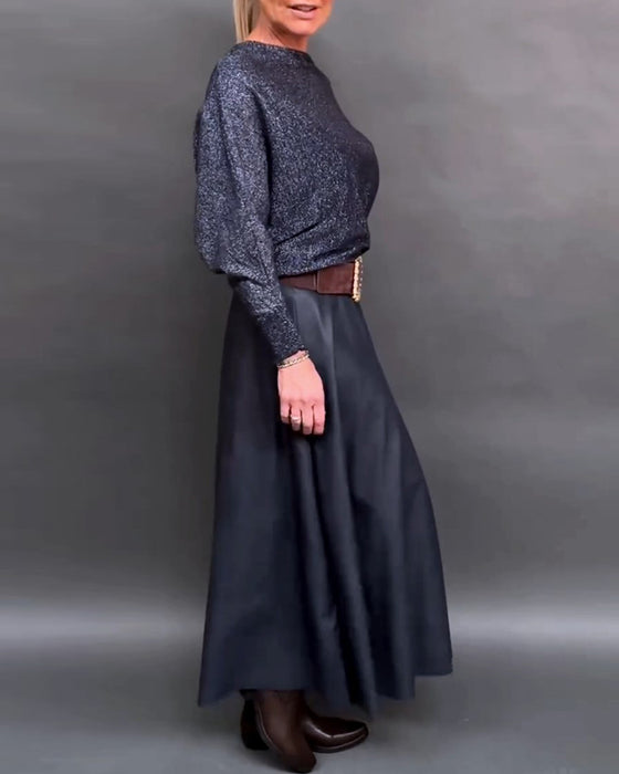 Skinnende topp med rund hals med dolmanermer