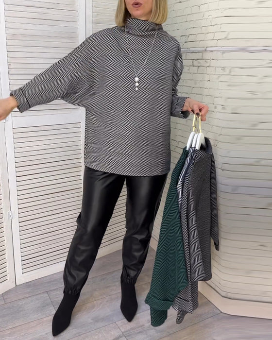 Uformelt topp med turtleneck med trykk