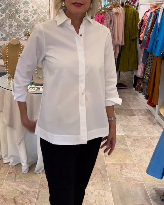 Ensfarget bluse med glidelås