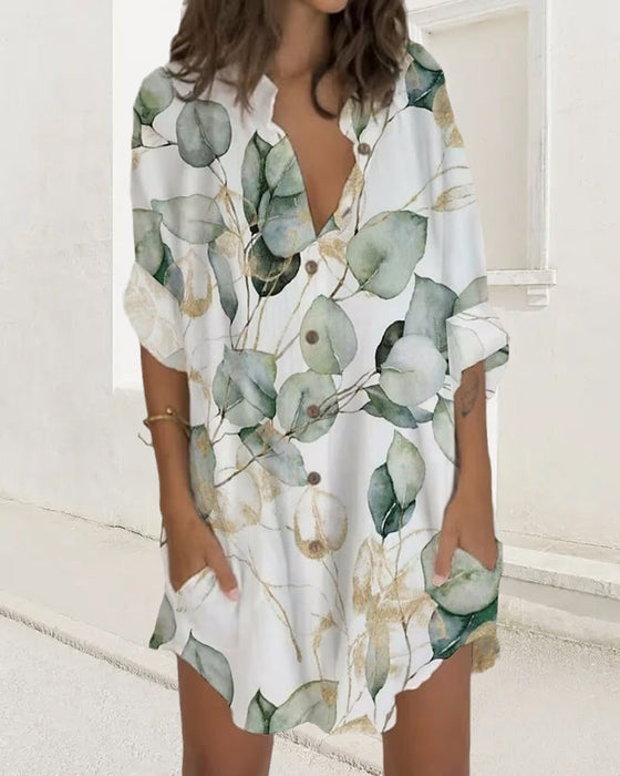 Kneppet kjole med lange ermer og lomme