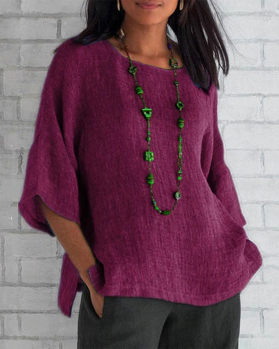 Ensfarget 3/4-ermet topp med rund hals