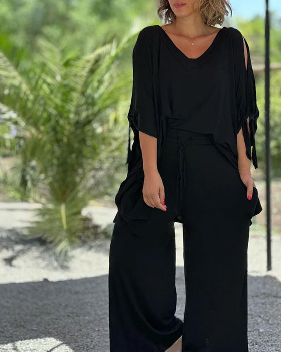 Ensfarget todelt sett med halve ermer