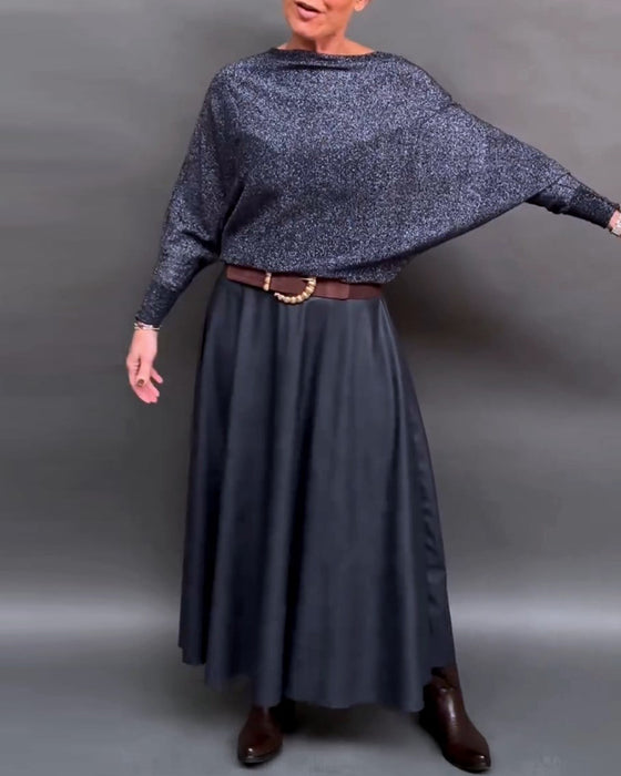 Skinnende topp med rund hals med dolmanermer