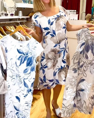 Elegant kortermet kjole med blomstermønster