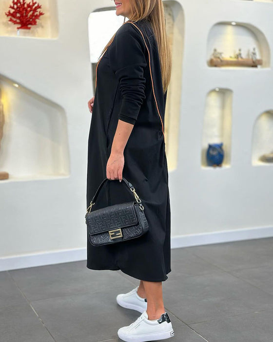 Skiftkjole med lomme og lange ermer