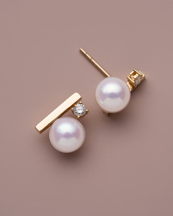 Enkle perle-øredobber og halskjede