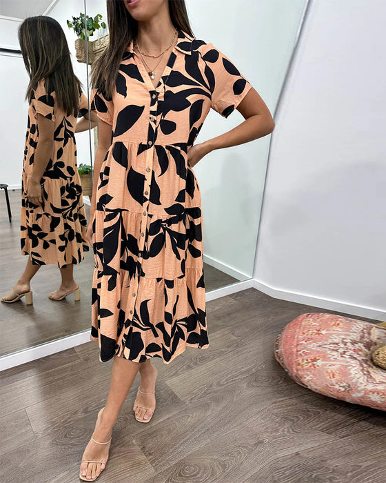 Kjole med lommer og jakkeslag og trykk