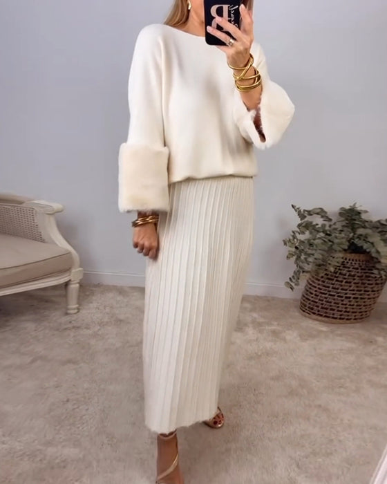 Elegant ensfarget genser med lange ermer