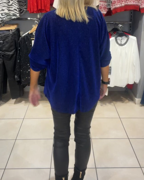 Løs topp med lange ermer og glidelås