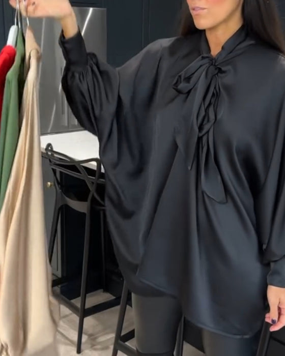 Båndkrage ensfarget og elegant bluse