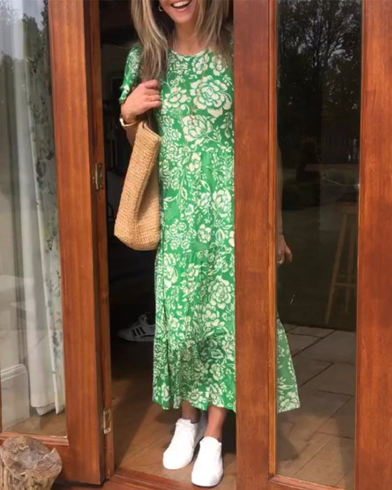 Kortermet lang kjole med blomstertrykk