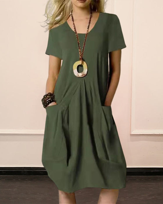 Ensfarget kortermet kjole med rund hals