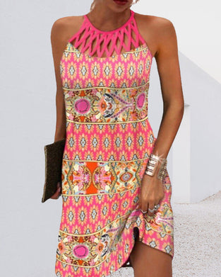 Ermeløs kjole med halterneck