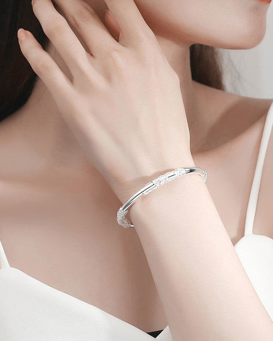 Armbånd med justerbart blomster