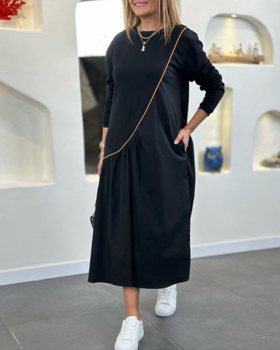 Skiftkjole med lomme og lange ermer