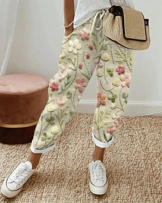 Bukser med lommer og trykk