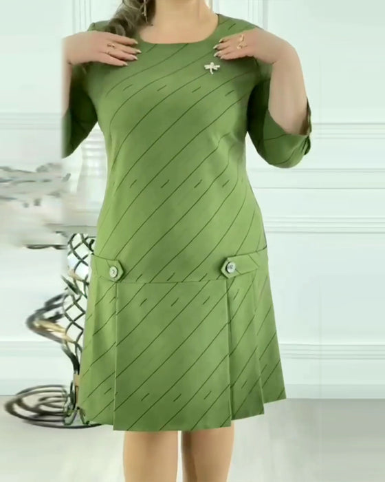 Elegant kjole med rund hals