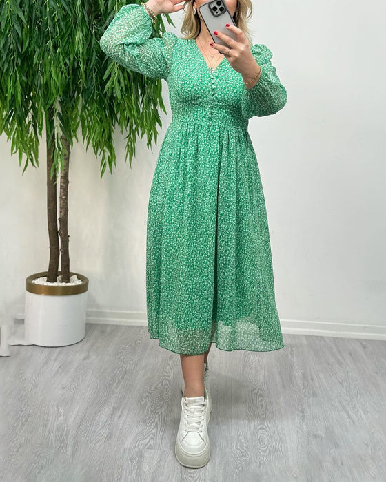 Elegant kjole med trykk med knapper