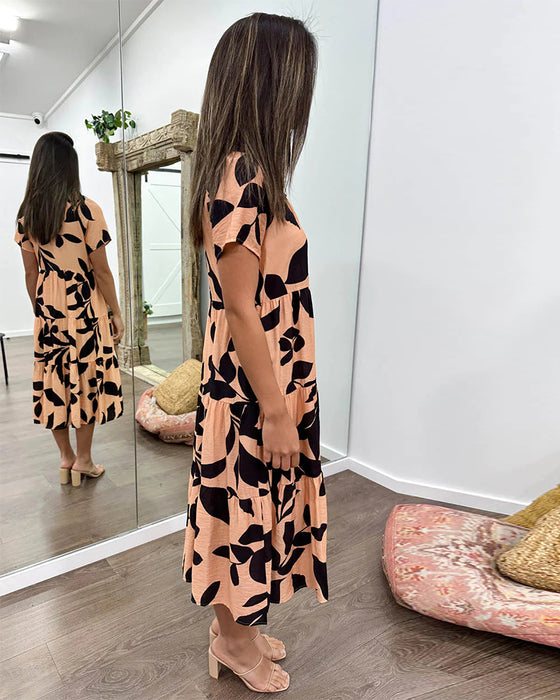 Kjole med lommer og jakkeslag og trykk