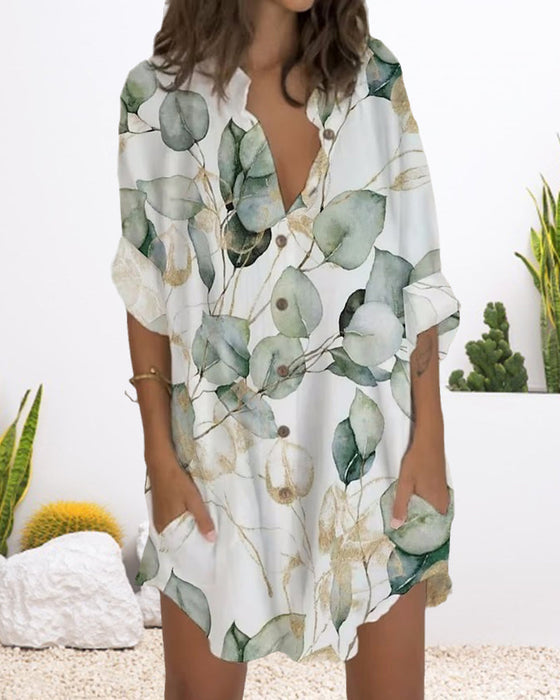 Kneppet kjole med lange ermer og lomme