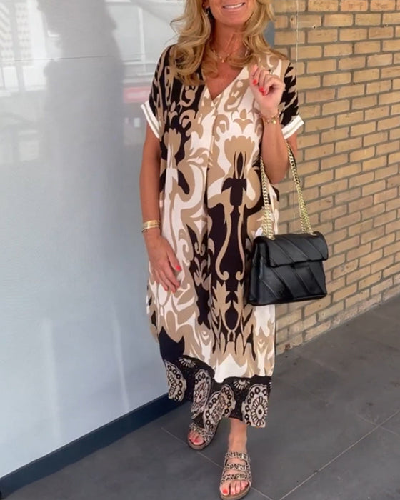 V-hals kjole med geometrisk trykk