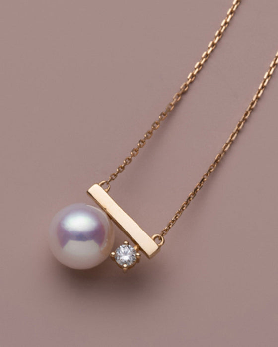 Enkle perle-øredobber og halskjede