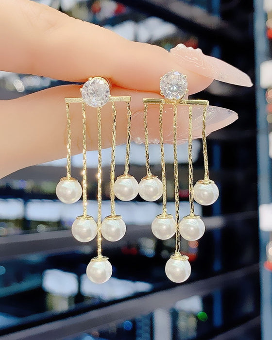 Dusk lange øredobber