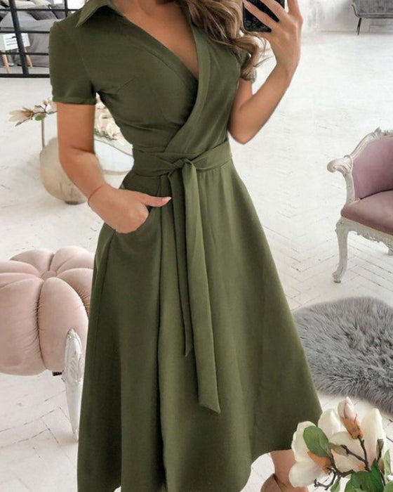 Elegant kjole med korte ermer
