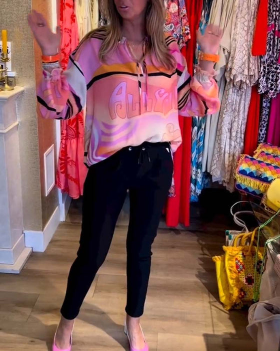 Casual topp med fjæring med kontrasttrykk