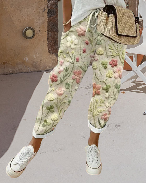 Bukser med lommer og trykk