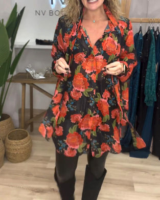 Bluse med blomstermønster og løs passform