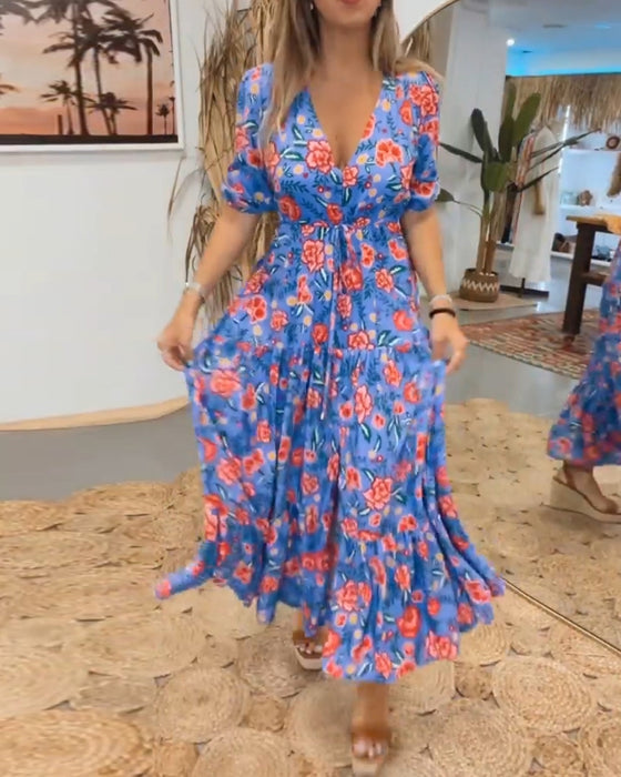 Kjole med rosetrykk og splitt