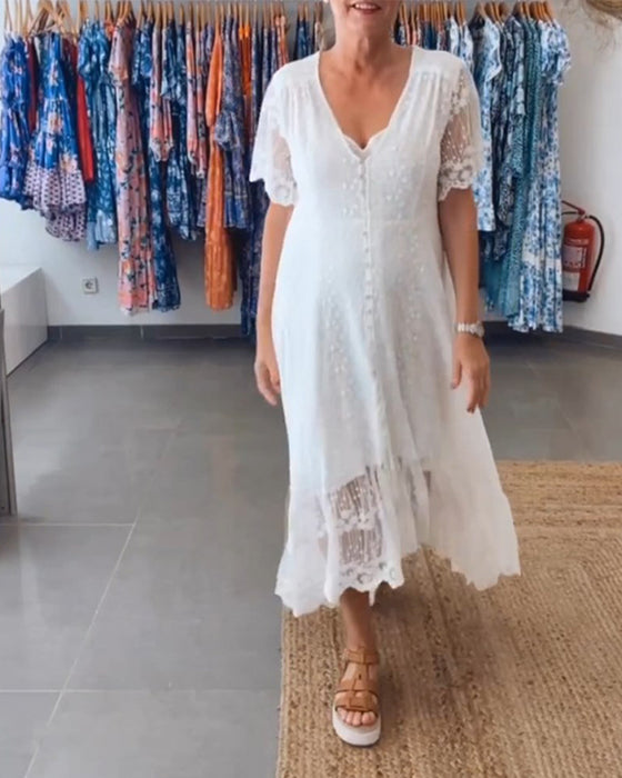 Floy kjole med dyp V og knapper