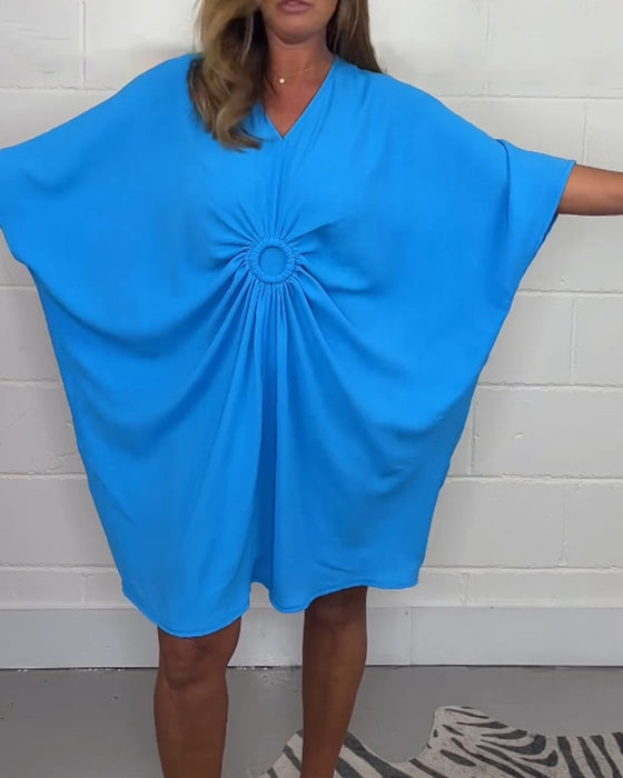 Flaggermusermet ensfarget kjole med V-hals