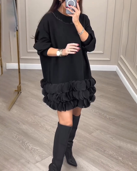 Elegant kjole med patchwork-blader