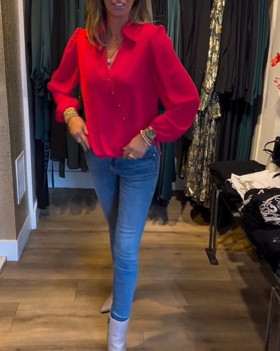 Elegant bluse med lanterneermer