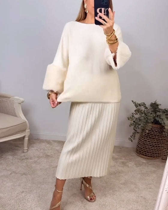 Elegant ensfarget genser med lange ermer