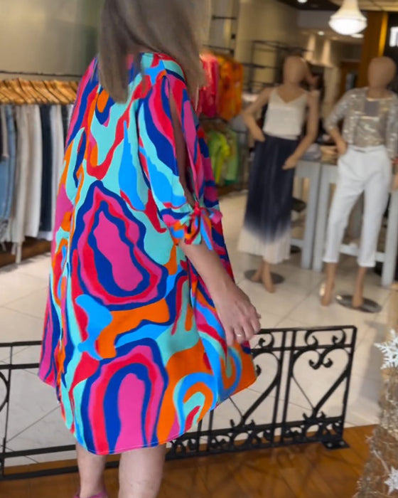 Løs kjole med rund hals og trykk