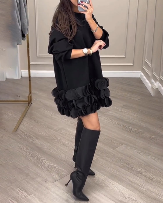 Elegant kjole med patchwork-blader