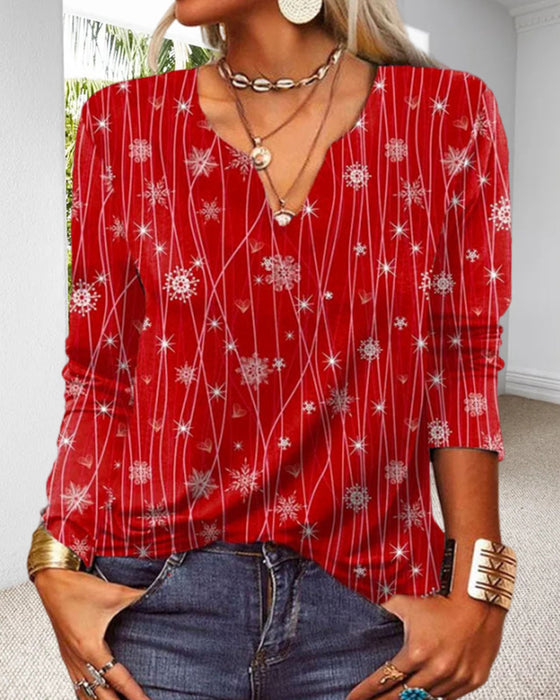 Elegant bluse med V-hals med snøfnugg