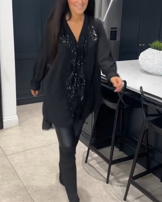 Bluse med volanger og elegant stil