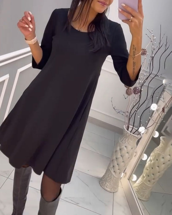 Ensfarget kjole med sløyfe bak