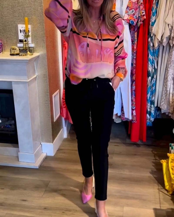 Casual topp med fjæring med kontrasttrykk